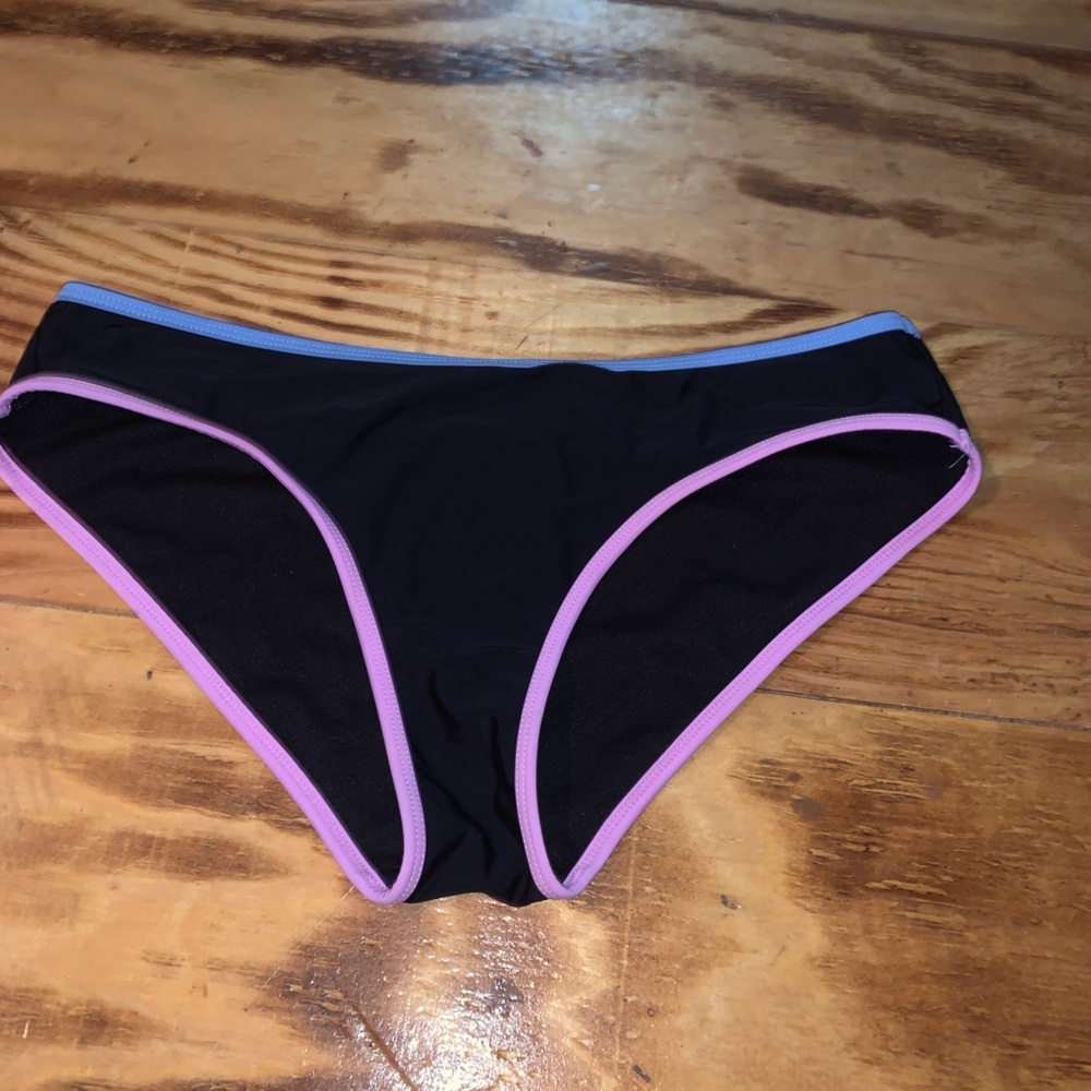 black with blue on the top and purple on bottom. to big on me.